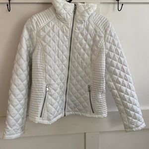 Padded, quilted jacket in woven fabric. Puffy